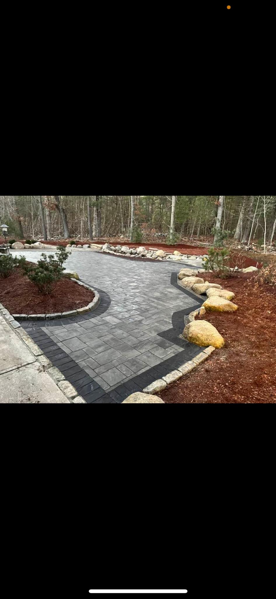 Curved paver walkway with decorative borders