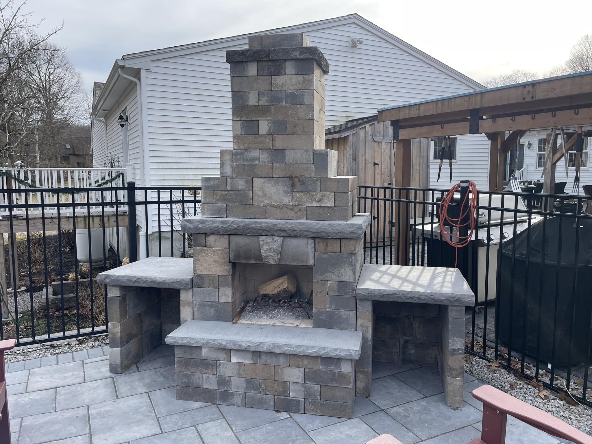 Stone Outdoor Kitchen with Seating